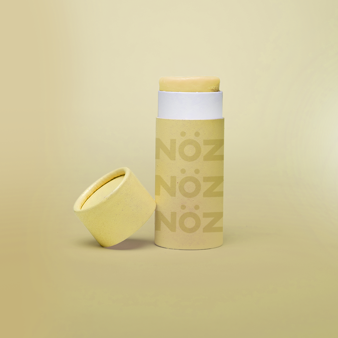 Yellow Cardboard Container of NöZ Reef Safe Sunscreen.